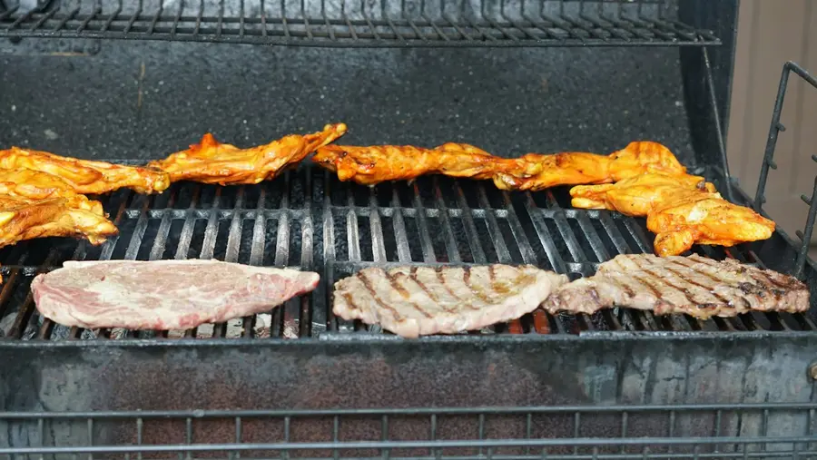 Chicken and steaks on the grill