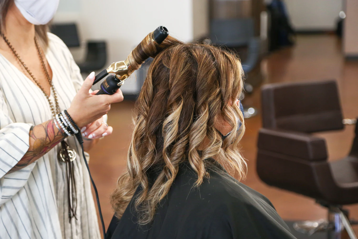 Curling iron waves on highlighted hair