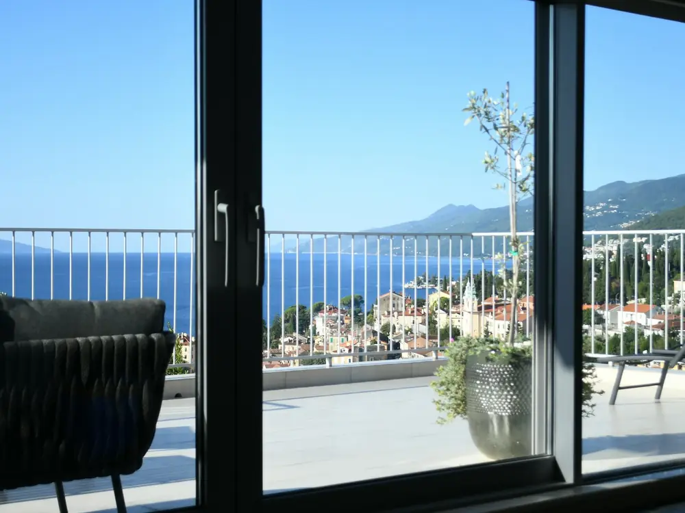 Tiled balcony with glass balustrade